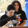 Former Hamas-held hostage Nurit Cooper, wife of slain hostage Amiram Cooper, eulogizes her husband during his funeral at Kibbutz Nir Oz, Nov. 2, 2025. Photo by Uriel Even Sapir/Hostages and Missing Families Forum.