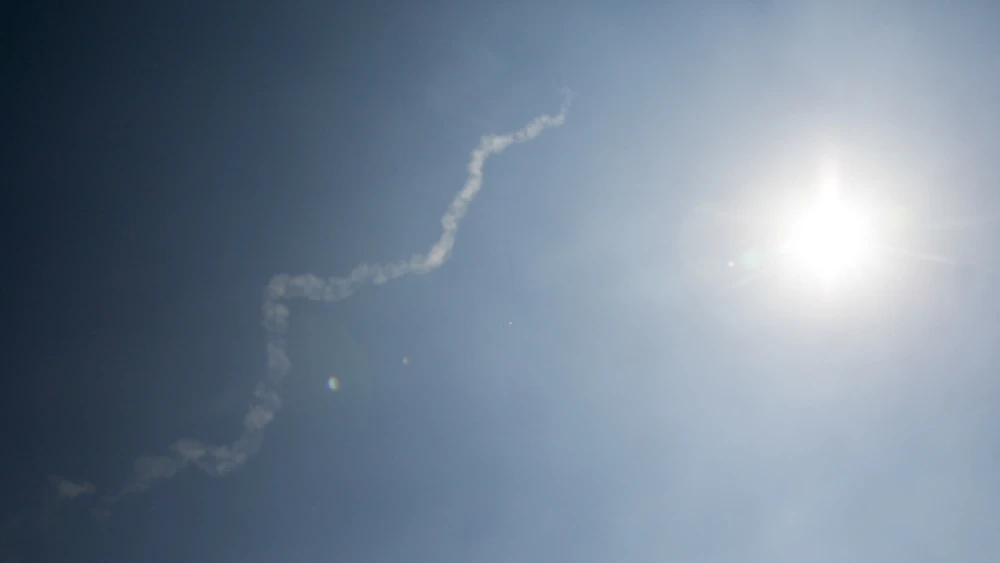 The exhaust trail of a David's Sling anti-missile system interceptor is seen following the launch of two OTR-21 "Tochka" tactical ballistic missiles in Syria, on July 23, 2018. Photo by David Cohen/Flash90.