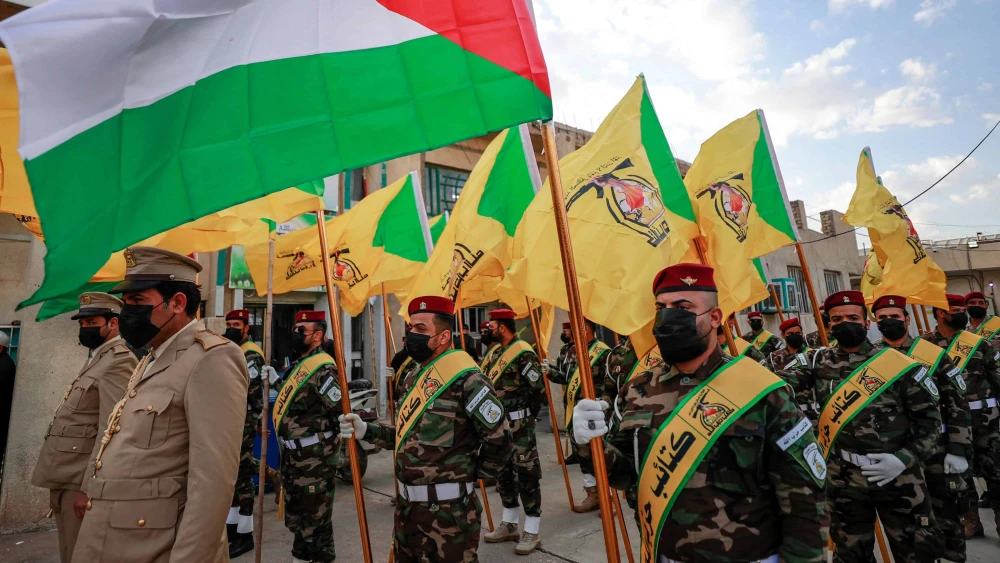 Members of Kata’ib Hezbollah attend the funeral in Baghdad of Fadel al-Maksusi, a terrorist who was also part of the Islamic Resistance in Iraq, on Nov. 21, 2023. Photo by Ahmad al-Rubaye/AFP via Getty Images.