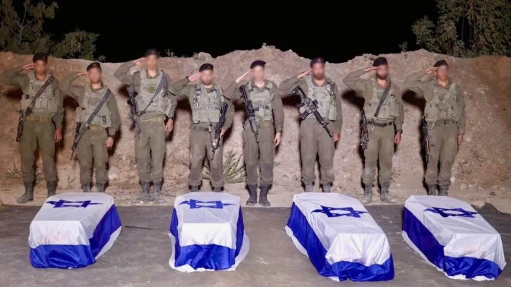 Israel Defense Forces soldiers receive coffins reportedly containing the bodies of four deceased hostages, Oct. 14, 2025. Credit: IDF.
