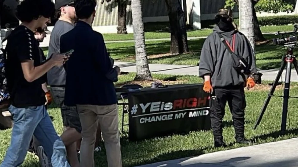 Antisemites man a table at Florida International University in Miami as part of the “Ye is Right” campaign, Feb. 10, 2023. Credit: Miami Against Fascism/Twitter.