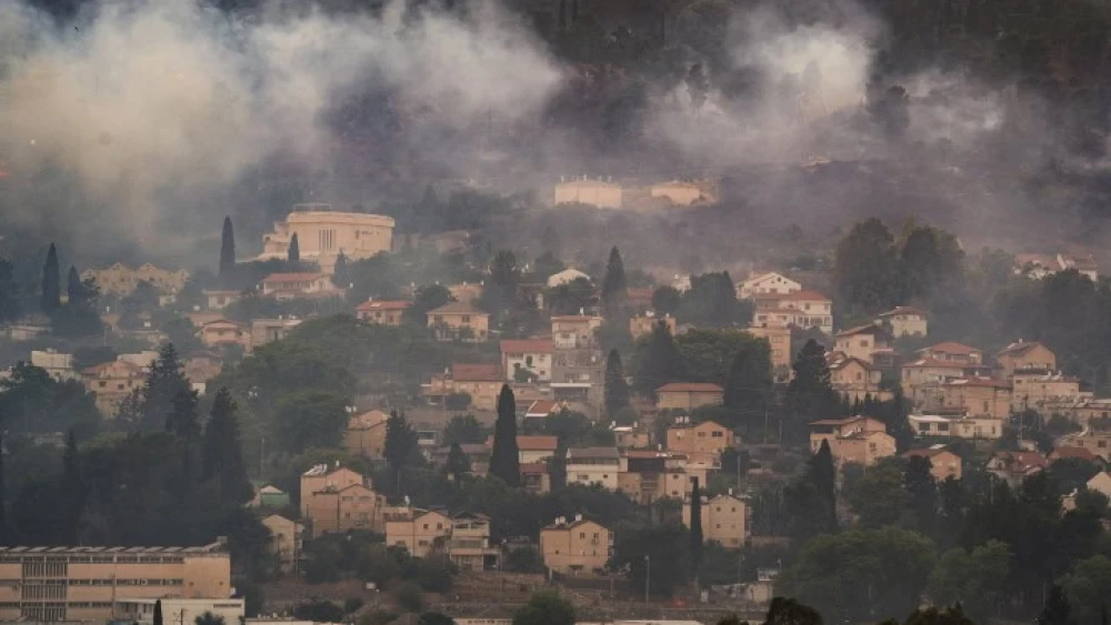 Smoke from a large fire caused by rockets fired from Lebanon, in the northern Israeli town of Kiryat Shmona, June 3, 2024. Photo by Ayal Margolin/Flash90.