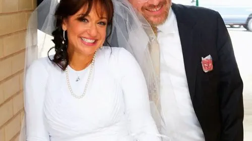 Chayim Lando and his third wife, Lea Sternbach. Lando, who has 19 children and stepchildren between the ages of 5 and 28 from his three marriages, says of parenting and step-parenting: “You have to figure out the appropriate thing for each child.” Credit: Courtesy of the Lando family.