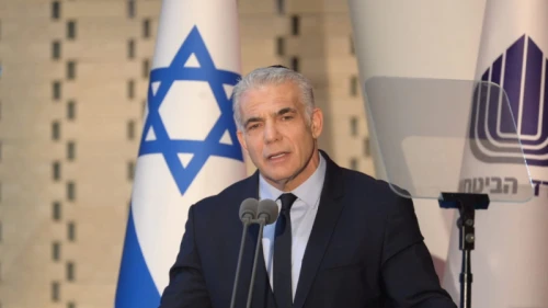 Interim Israeli Prime Minister Yair Lapid delivers a speech at a ceremony at Mount Herzl in Jerusalem for Israel Defense Forces soldiers who fell in the Yom Kippur War, Oct. 6, 2022. Credit: Prime Minister's Office.