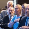 Janet Huckabee, third from right, and her husband Mike Huckabee and Mike Evans sing the American anthem at the Friends of Zion Heritage Center in Jerusalem, Israel on May 6, 2025. Photo by David Sa'ad.
