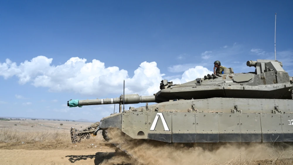 An Israeli tank near the Syrian border in the northern Golan Heights, Oct. 17, 2021. Photo by Michael Giladi/Flash90.