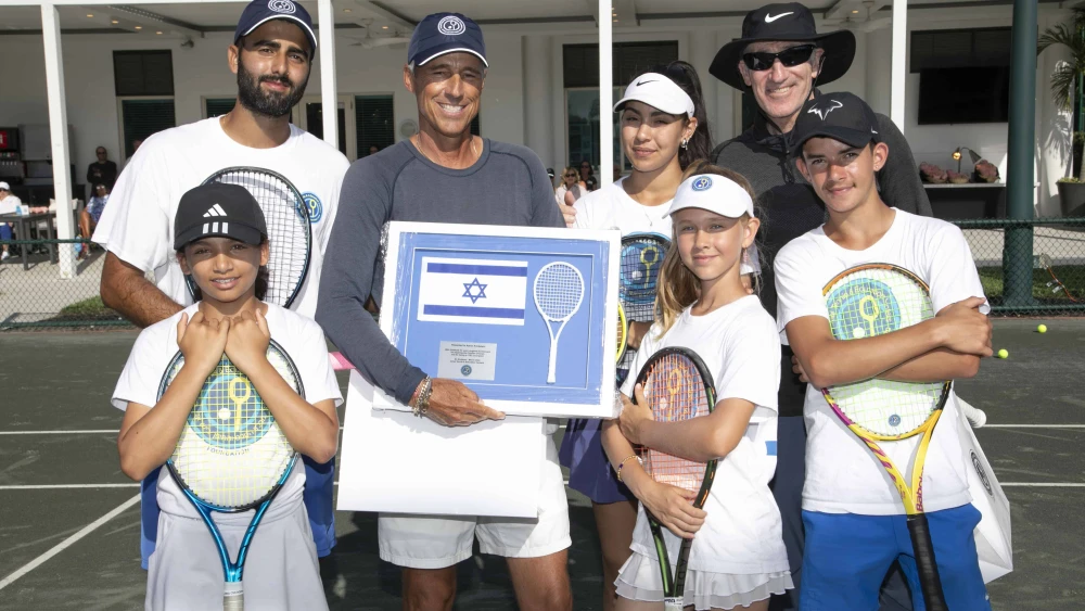 From left, Israel Tennis & Education Centers coach Amit Kakon with Aaron Krickstein, Inbar Poni, tennis coach Brad Gilbert and other ITEC participants. Credit: Courtesy of the Israel Tennis and Education Centers.