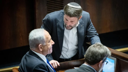 Israeli Prime Minister-designate Benjamin Netanyahu speaks with Religious Zionism Party head Bezalel Smotrich during a vote at the Knesset in Jerusalem, on Dec. 20, 2022. Photo by Yonatan Sindel/Flash90.