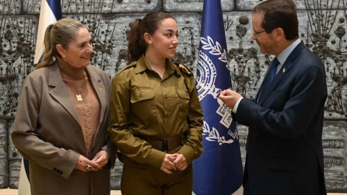 Cpl. Ori Megidish meets with Israeli President Isaac Herzog and his wife, Michal, Jan. 11, 2024. Photo by Haim Zach/GPO.