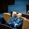 Former Israeli Prime Minister Naftali Bennett, current Israeli leader Yair Lapid and Defense Minister Benny Gantz attend a plenum session in the Knesset on May 23, 2022. Photo by Yonatan Sindel/Flash90.