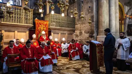 Members of the clergy and the local catholic community attend a mass for the late Pope Emeritus Benedict XVI, led by the Latin Patriarch Pierbattista Pizzaballa at the Church of the Holy Sepulchre, in Jerusalem's Old City on Jan. 10, 2023. Photo by Olivier Fitoussi/Flash90.