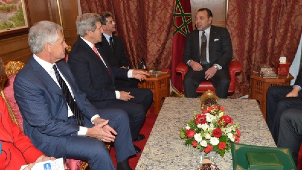 U.S. Secretary of State John Kerry and U.S. Secretary of Defense Chuck Hagel with King Mohammed VI of Morocco at the Moroccan Ambassador to the United States' residence in Washington, D.C., on Nov. 20, 2013. Credit: U.S. State Department.
