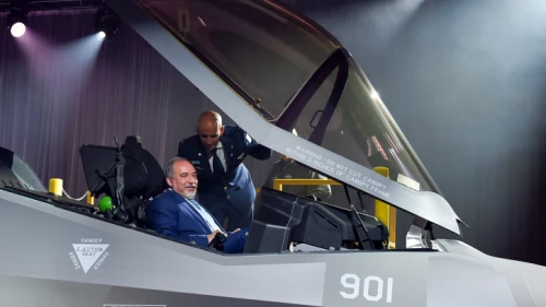 Israeli Defense Minister Avigdor Lieberman sits inside the new F-35 stealth aircraft during a ceremony at the manufacturing factory the Lockheed Martin aerospace company in Fort Worth near Dallas on June 23, 2016. Photo by Ariel Hermoni/Ministry of Defense.