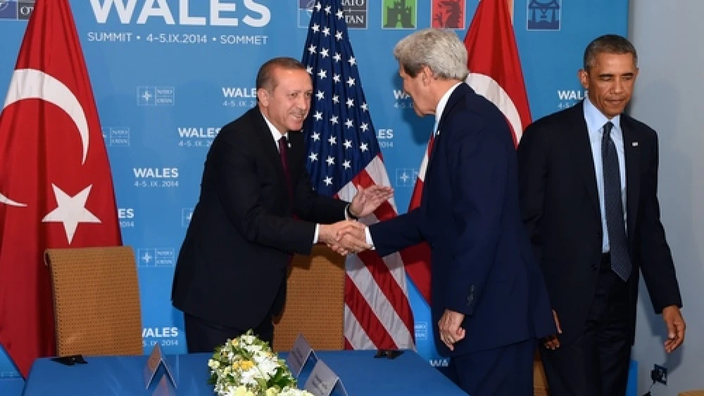 U.S. Secretary of State John Kerry shakes hands with Turkish President Recep Tayyip Erdogan before joining U.S. President Barack Obama for a bilateral meeting between the leaders on the sidelines of the NATO Summit, Sept. 5, 2014, in Newport, Wales, United Kingdom. Credit: U.S. State Department.