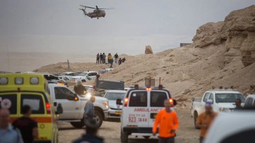 Rescue forces near the scene where young Israelis were swept in the flooding of the Tzafit Stream near the Dead Sea on April 26, 2018. Heavy rainfall caused flooding across the desert, causing many streams to overflow. Photo by Hadas Parush/Flash90.