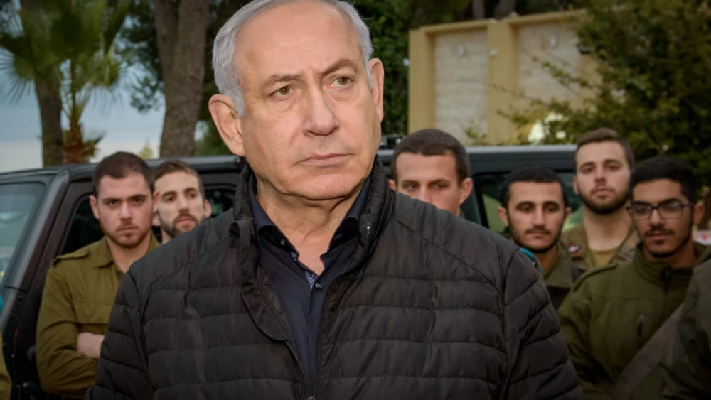 Israeli Prime Minister Benjamin Netanyahu speaks with Israeli soldiers during his visit at the Northern Command base in Tzfat on Dec. 11, 2018. Photo by Basel Awidat/Flash90.