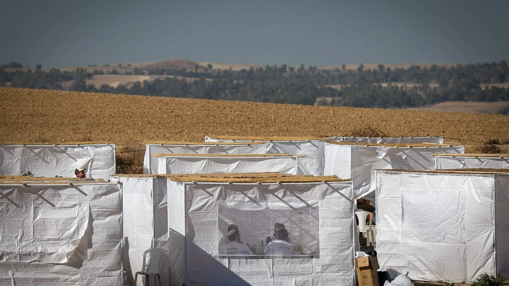 Advocates of re-establishing Jewish civilian presence in the Gaza Strip celebrate Sukkot during an event near the Israeli border with the Gaza Strip, Oct. 21, 2024. Photo by Flash90.