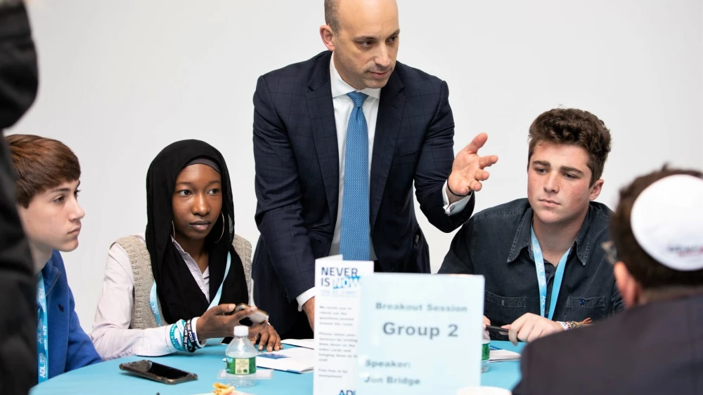 Jason Greenblatt, CEO and national director of the Anti-Defamation League, with students at the “Never Is Now” conference in New York, Nov. 2019. Source: Facebook.