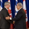 Israeli Prime Minister Benjamin Netanyahu shakes hands with Canadian Prime Minister Stephen Harper during a welcoming ceremony for Harper at Netanyahu's office in Jerusalem on Jan.19, 2014. Photo by Flash90.