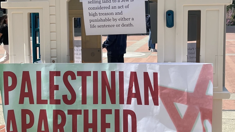 SSI also erected a plastic children’s playhouse. On the house there is a “For Sale” sign, stating that under Palestinian law, selling a house to a Jew is considered high treason, punishable by either a life sentence or death. Credit: Courtesy.