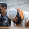 Amiram Ben-Uliel, accused of the Duma arson murders in July 2015, arrives to a court hearing on his appeal, at the Supreme Court in Jerusalem, on March 7, 2022. Photo by Yonatan Sindel/Flash90.