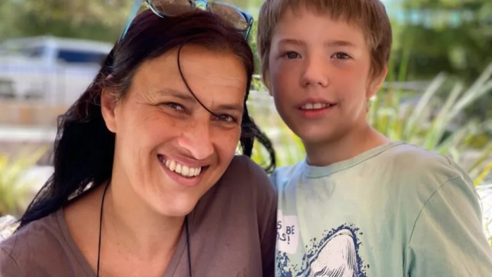 Gili Maymon, manager of Nes Harim, with Moshik, a child from Ukraine. Photo by Nicky Blackburn