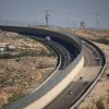 View of Route 4370, northeast of Jerusalem, which connects the Geva Binyamin area to Route 1, and separates vehicles of Israeli citizens and non-citizens, Jan. 10, 2019. Photo by Yonatan Sindel/Flash90.