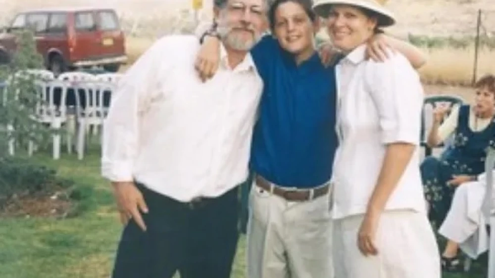 Koby Mandell with his parents, Seth and Sherri Mandell, at his bat mitzvah. Credit: Koby Mandell Foundation.