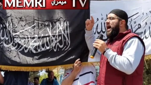 In this still image taken from a video posted on May 10, 2019, Palestinian cleric Nidhal Siam is seen addressing a crowd outside the Al-Aqsa mosque in Jerusalem. (MEMRI)