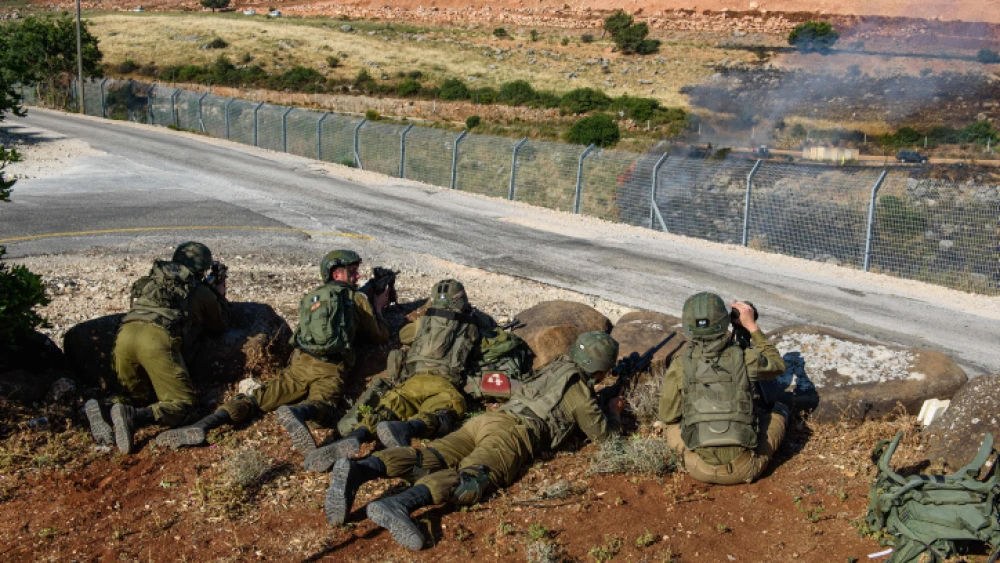 Israeli soldiers guard in Metula, on the border between Israel and Lebanon, on May 14, 2021, after Lebanese protesters crossed the Israeli border fence earlier in the day. Photo by Basel Awidat/Flash90.
