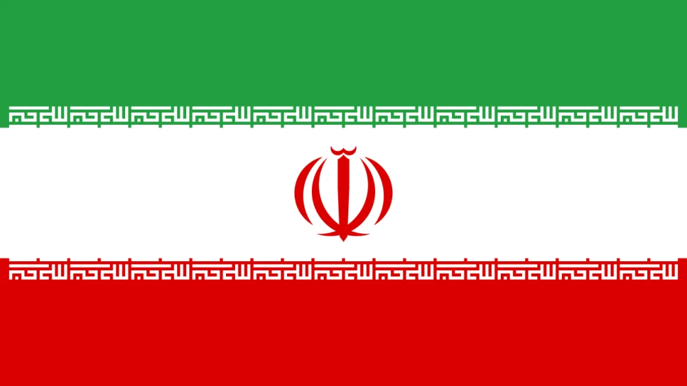 An Iranian flag. Credit: Hamid Nadimi via Wikimedia Commons.