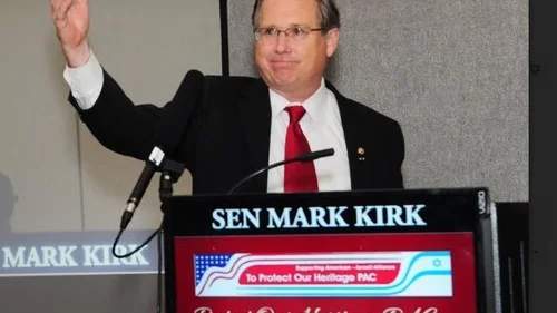 Former Sen. Mark S. Kirk addresses the crowd Aug. 27 at the Northbrook Hilton outside of Chicago. Credit: DejaViewsUSA.com