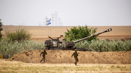 IDF Artillery Corps seen firing into Gaza near the Israeli border on May 20, 2021. Photo by Yonatan Sindel/Flash90.