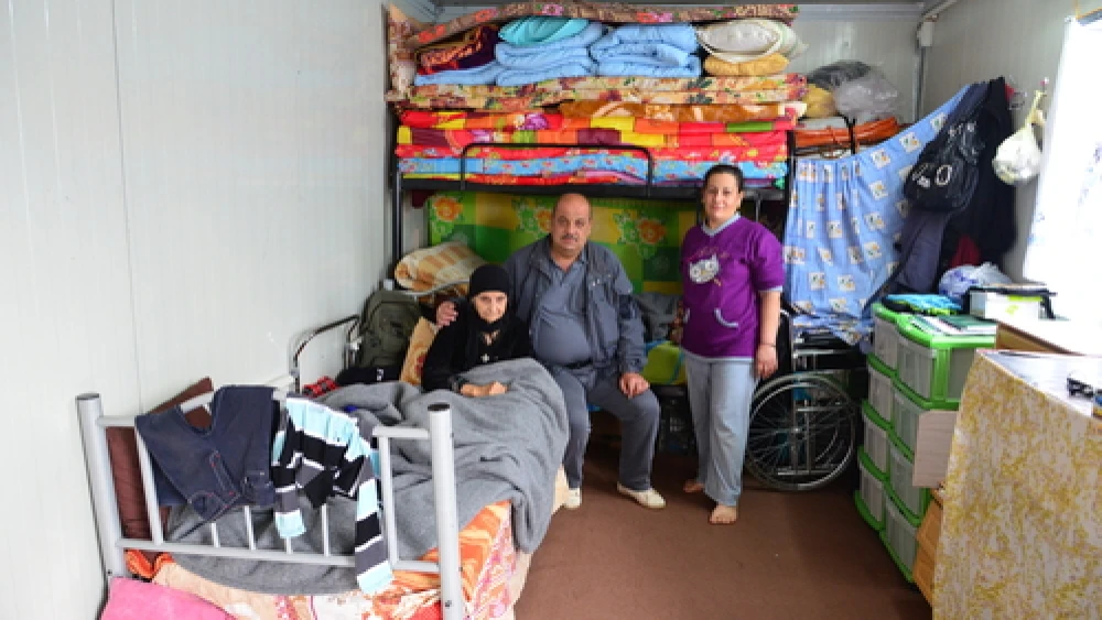 Displaced Iraqi Christians in cramped living conditions in Erbil, the largest city in Iraqi Kurdistan. Credit: Aid to the Church in Need (ACN).
