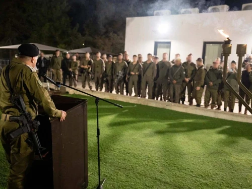 Israel Defense Forces Chief of Staff Lt. Gen. Eyal Zamir lights the first Chanukah candle with troops of the 91st Division, Dec. 14, 2025. Credit: IDF.