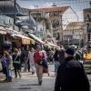 Shoppers strolling at the Mahane Yehuda market in Jerusalem, April 14, 2024. Photo by Yonatan Sindel/Flash90.