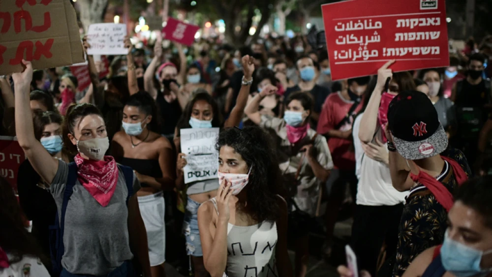 Israelis take part in a demonstration in support of the 16-year-old victim of a gang rape in Eilat a few days ago, in Tel Aviv. Aug. 20, 2020. Photo by Tomer Neuberg/Flash90.