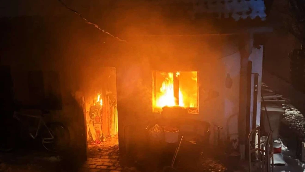 A fire burns on the property of Andreas Büttner, Brandenburg’s commissioner for combating antisemitism, in Templin, Germany, on Jan. 3, 2025. Credit: Courtesy of Ron Prosor.