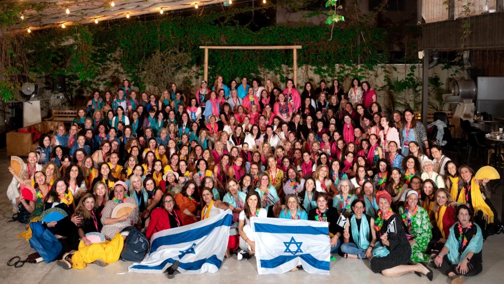 Momentum participants and leadership gather for an opening night ceremony in Tel Aviv. Photo credit: Aviram Valdman
