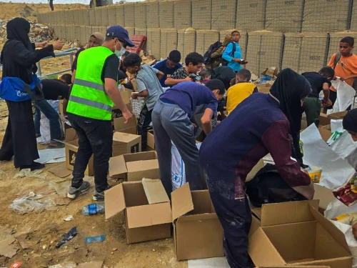 Palestinians receiving aid from the Gaza Humanitarian Foundation in Gaza, June 2025. Credit: GHF.