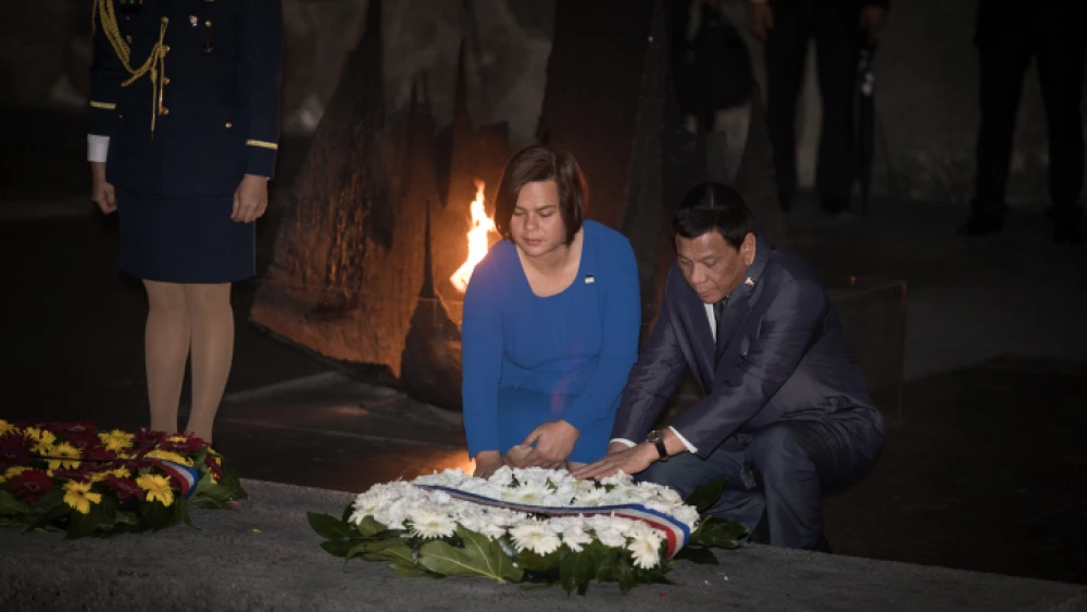 Philippines President Rodrigo Duterte visits the Yad Vashem Holocaust Memorial Museum in Jerusalem during an official visit to Israel. There, he placed a wreath with his daughter, Sara Duterte, on Sept. 3, 2018. Photo by Hadas Parush/Flash90.