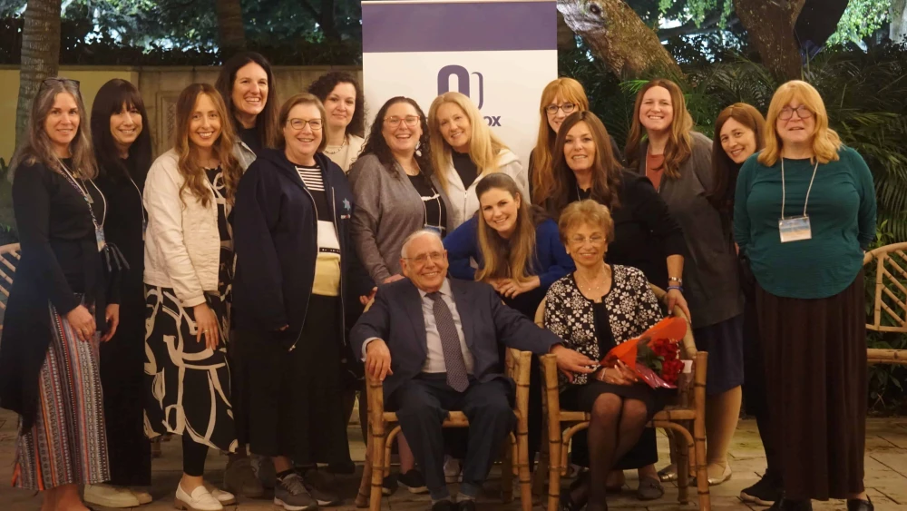 Honorees Marvin and Esther Schenker surrounded by executive directors from all over North America. Credit: Courtesy of the Orthodox Union.