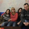 Click photo to download. Caption: With no money to replace the decayed wallpaper in their poorly insulated three-room apartment in Bulgaria, parents Harry and Yana allowed their three children to simply draw on the walls to bring cheer to their home. Economic hardships afflicting Europe pose a dire a threat to Jews, writes Alan H. Gill, CEO of the American Jewish Joint Distribution Committee (JDC). Credit: JDC.