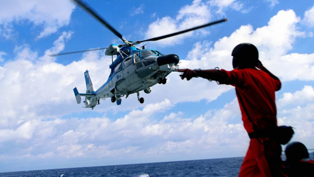 Illustrative: A demonstration on the 60th Independence Day of Israel in front the beach of Tel Aviv: A naval chopper landing on The Saar 5 Missile Boat. Photo by: Moshe Shai/Flash90.