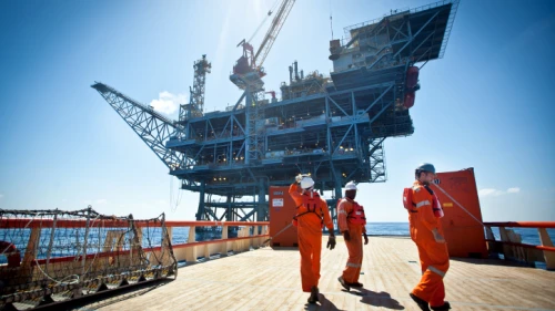 Workers on the Israeli Tamar gas-processing rig off the coast of Ashkelon. Noble Energy and Delek are the main partners in the Tamar gas field, estimated to contain 10 trillion cubic feet of gas, June 23, 2014. Photo by Moshe Shai/Flash90.