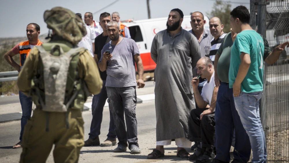 The family of the Palestinian man who stabbed a soldier, at the Bell checkpoint on Road 443, Aug. 15, 2015. Photo by Hadas Parush/Flash90.
