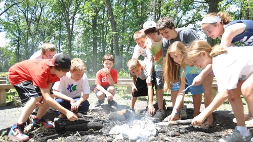 A campfire at Webster, Wisconsin-based Herzl Camp, a JCamp180-supported summer camp. Credit: Herzl Camp.