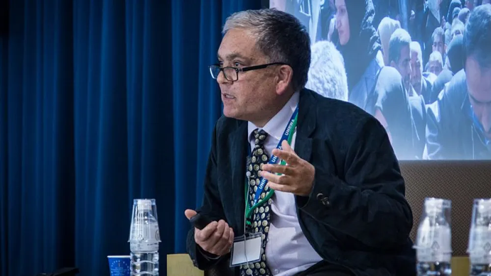 UNRWA spokesperson Chris Gunness speaks at the 2014 International Media Seminar on Peace in the Middle East at Sophia University in Tokyo, on June 9, 2014. Photo: United Nations / John Gillespie via Wikimedia Commons.