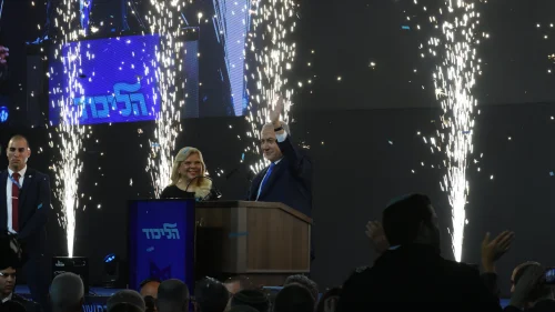 Israeli Prime Minister Benjamin Netanyahu, with his wife, Sara, by his side, addresses supporters as the the results in Israel's elections are announced at party headquarters in Tel Aviv on April 10, 2019. Credit: Gili Yaari/Flash90.