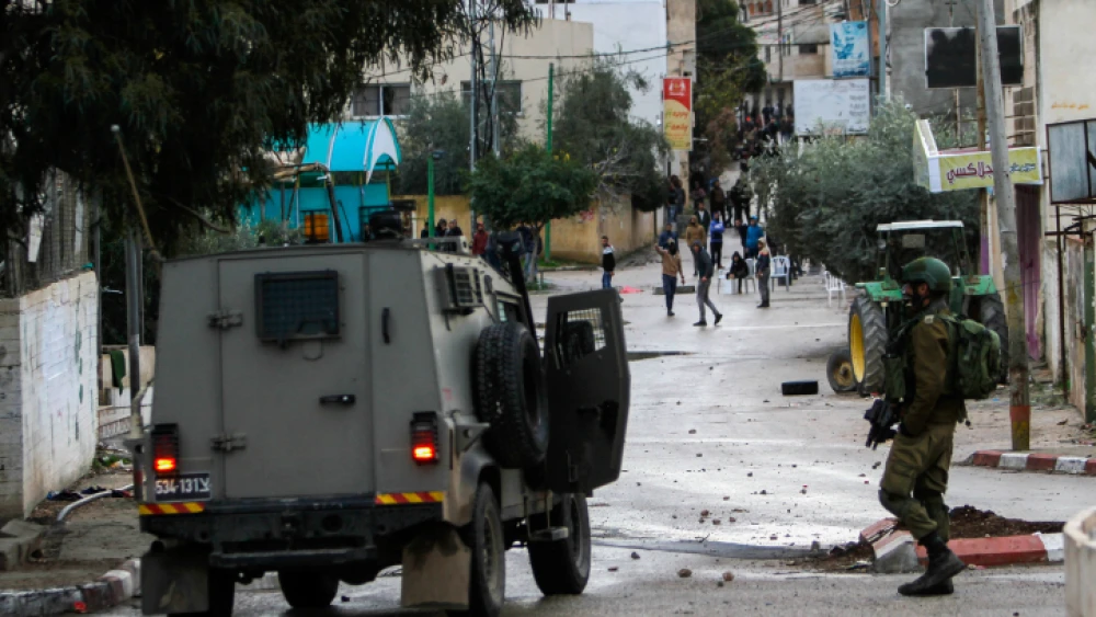 Palestinians clash with Israeli soldiers in the West Bank city of Jenin, Jan. 18, 2018. Photo by Nasser Ishtayeh/Flash90.